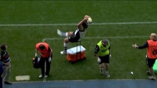 Nick Easter falls over a cooler