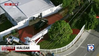 Crane topples over near Hialeah home