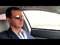 بشار الأسد يقود سيارته فى شوارع سوريا بدون حراسة متجها الى الغوطة