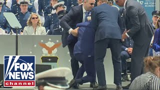 Biden falls during graduation ceremony