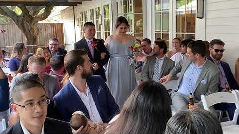 Best Man and Maid of Honor walk on the aisle