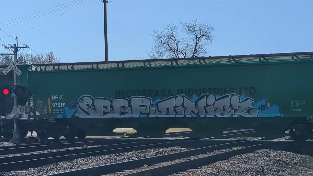 (Rare) Southbound CN Mainfest receives orders from the J tower at West Chicago on the Leightion sub 