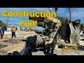 Construction Fail! Machine Falls off Trailer