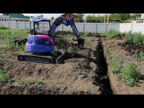 видео о том, как убирали участок и выкопали траншею под фундамент