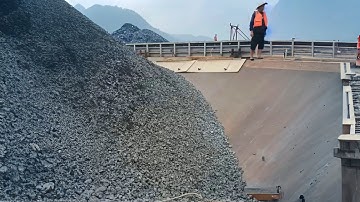 Barge unloading 3300 tons of large ore - Vlog of work on the barge, smooth flow of ore