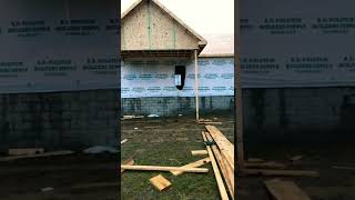 Sheathing goes up on the house