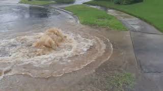 Blocked storm drain flooding road , Dramatic Footage from Sydney Australia.