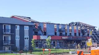 1 dead, 2 missing after vehicle hits Edmonton building, causing fiery explosion