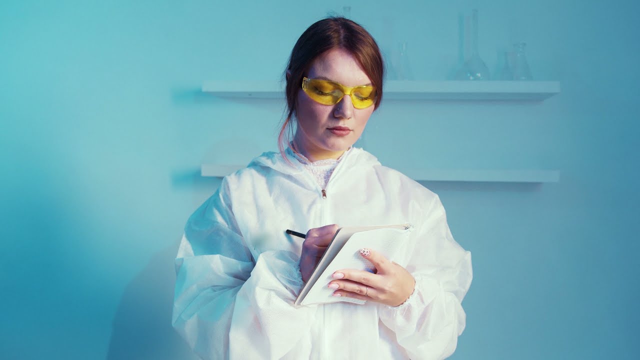 Scientists Stock Footage | Female Scientist Taking Note | 4K Free Stock Video | Copyright Free Video