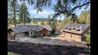 Close-in Sherwood country property with 6 car garage and carriage house