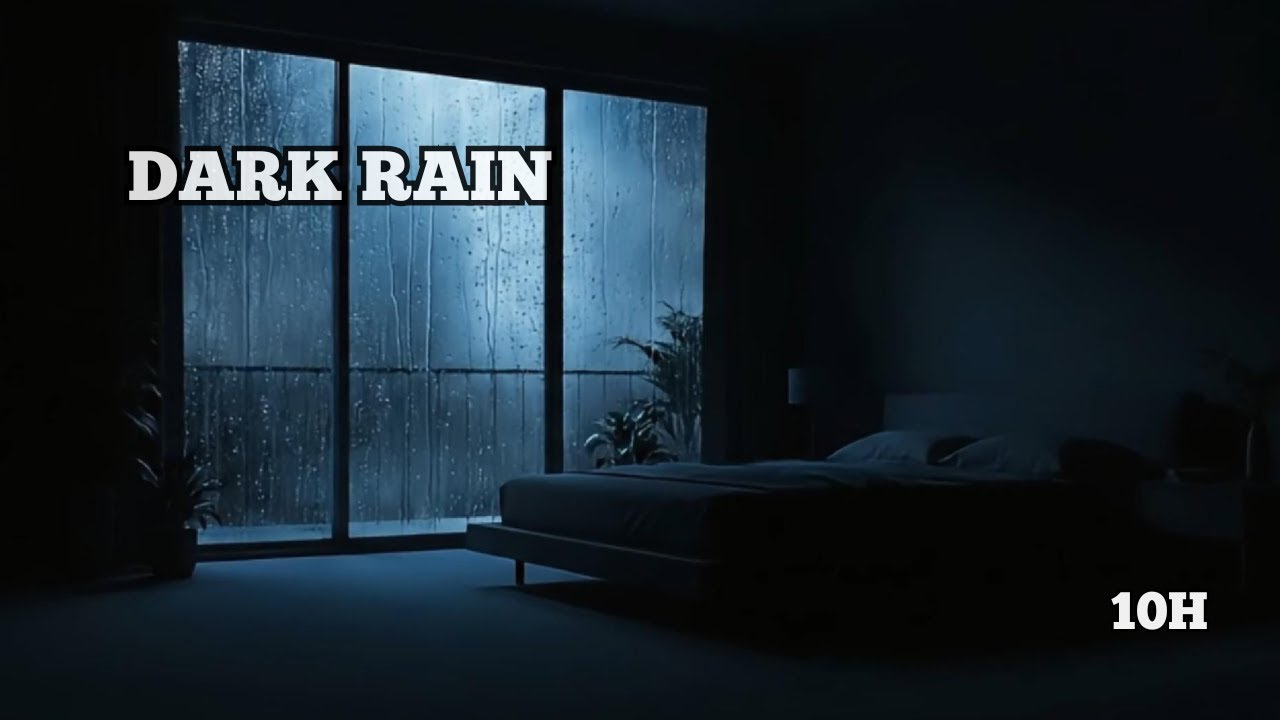 dark rain against a bedroom window at night