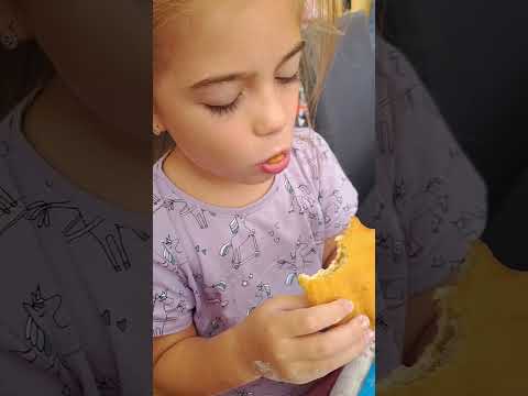 eating pastry 😀 yummy 😋 happy little girl