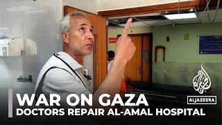 War on Gaza: Doctors and medics repair parts of damaged al-Amal hospital