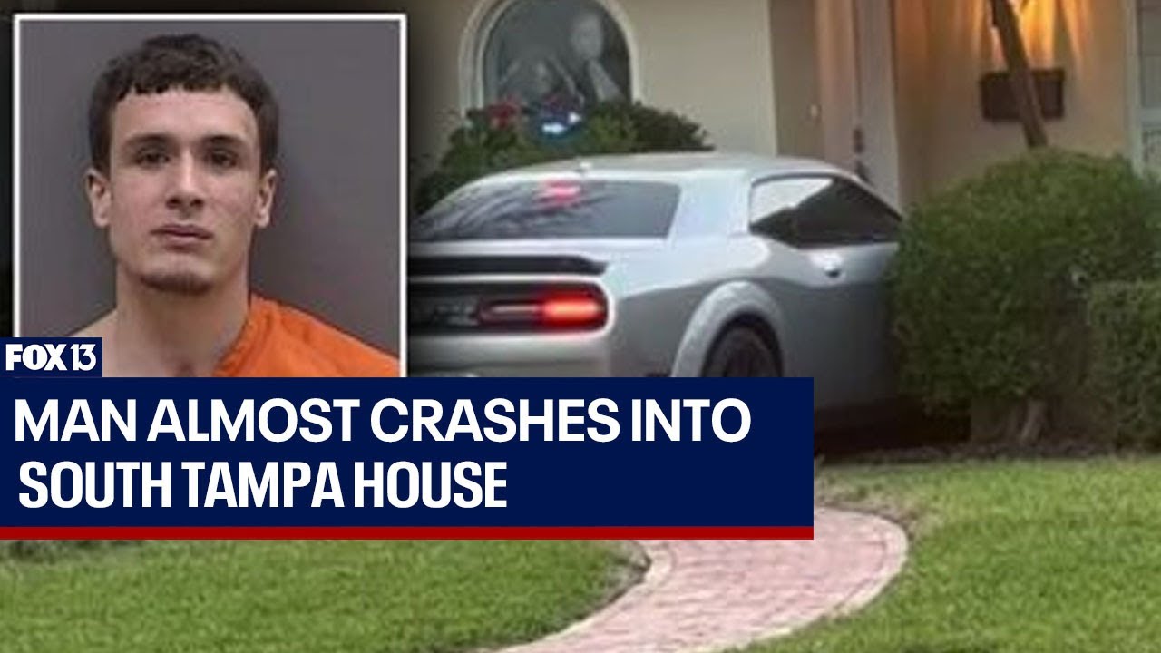 Speeding driver almost crashes into South Tampa house - YouTube