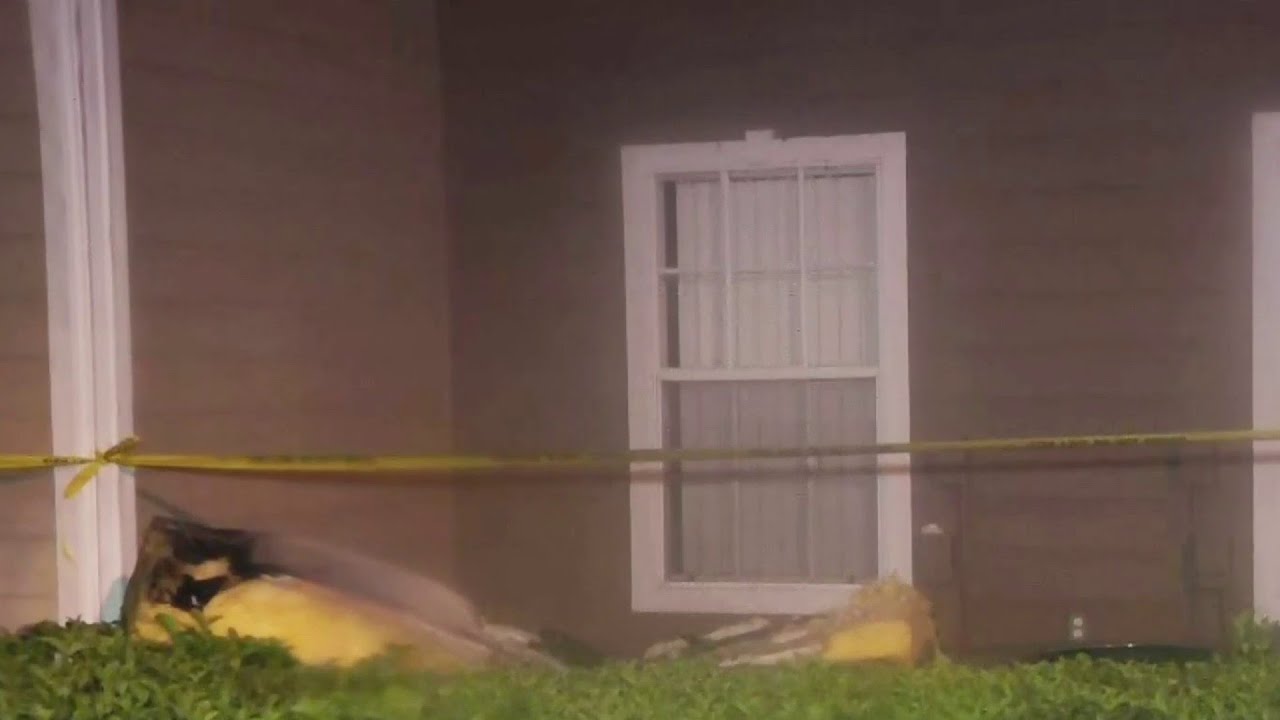 Woman jumps from apartment to escape fire, lands on AC unit