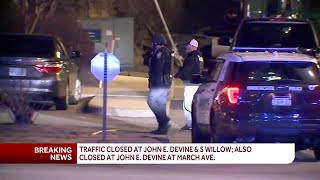 Manchester police: One person taken to hospital; subjects barricaded inside hotel