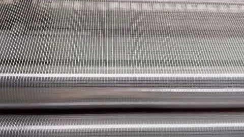 Fiberglass mesh weaving machine