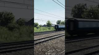 TSW5 Class 47 at speed with a very short formation, approaching Carlisle