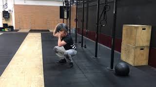 Deadball on shoulder squat