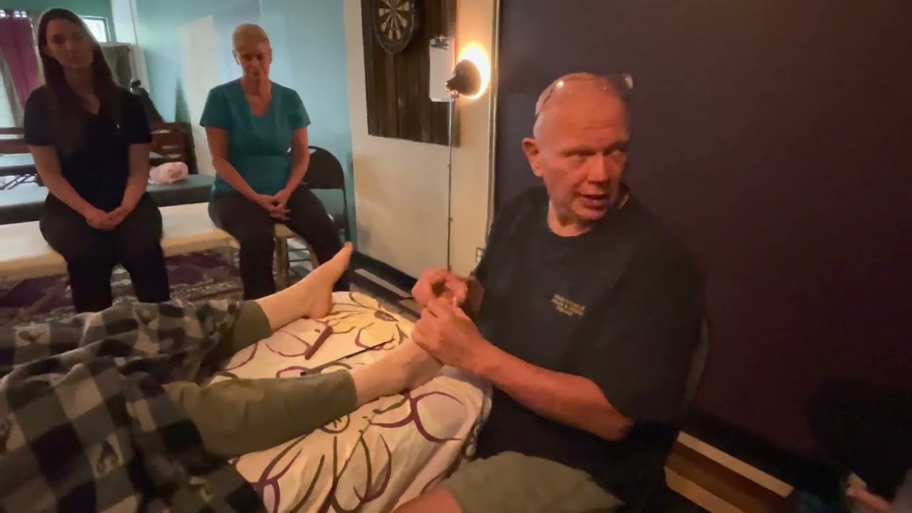 Foot massage using massage tools demonstration by Naturopath Brandon Raynor part 4 in Edmonton.