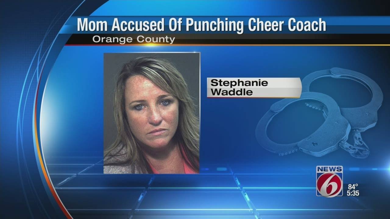Mom accused of punching cheer coach - YouTube