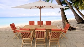 Beliani Acacia wood garden furniture - table, 8 chairs terracotta, parasol - JAVA - Eng