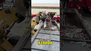 A 68 cbm semi-trailer compactor truck, carrying 44 tons of domestic waste.