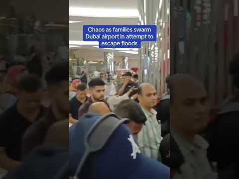 CHAOS as families SWARM Dubai airport in attempt to escape floods