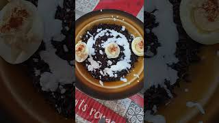 risotto nero integrale con fonduta di Caprino e uova sode con salsa tonnata