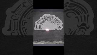 Aztec style serpent engraved on slate.