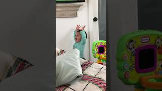 Little boy runs around living room yelling then trip and faceplants