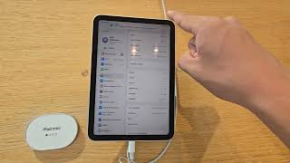 The Apple iPad mini 7 in Apple Store running iPadOS 26