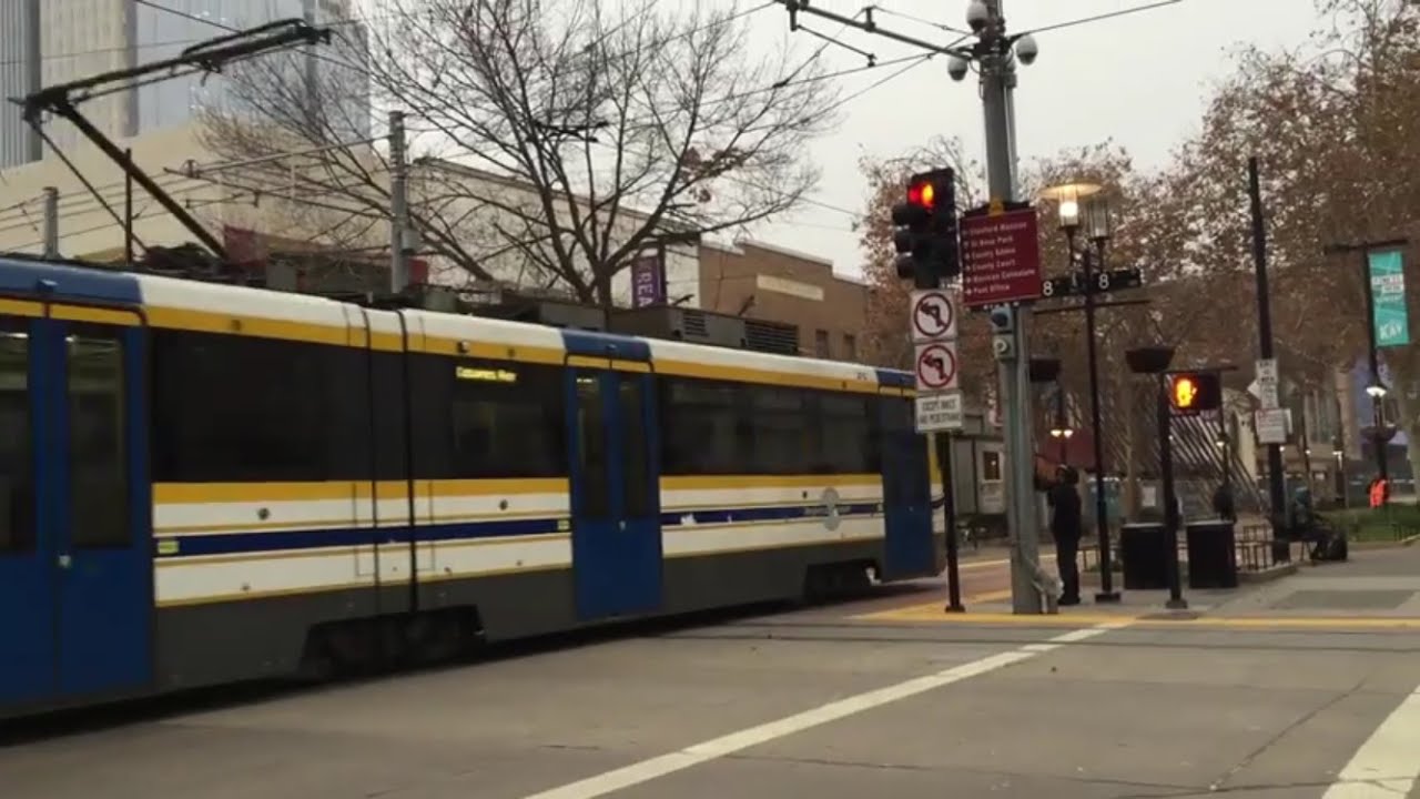 Sacramento Light Rail Gold And Blue Line Trains Cross Each Other On 8th sacramento-light-rail-gold-and-blue-line-trains-cross-each-other-on-8th