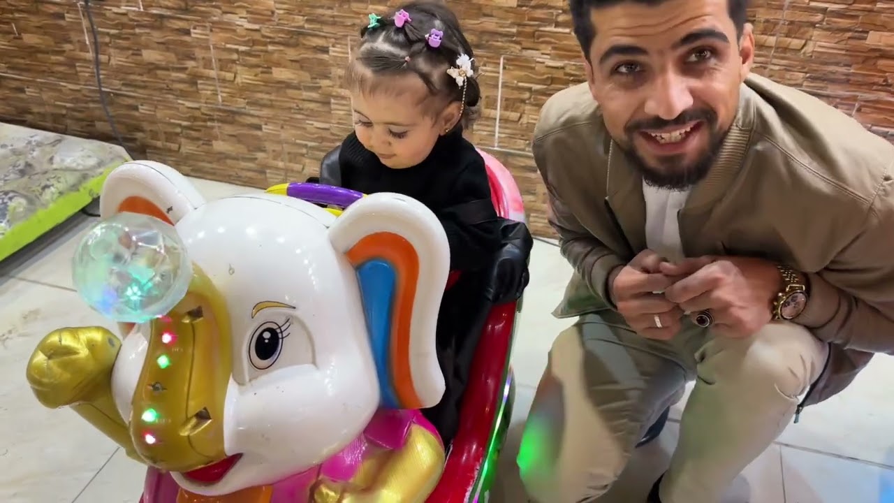 اجواء العيد في مدينة الملاهي مع الاطفال في سوريا