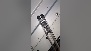 Cleaning the charge corotron in the Konica Minolta DI 1611