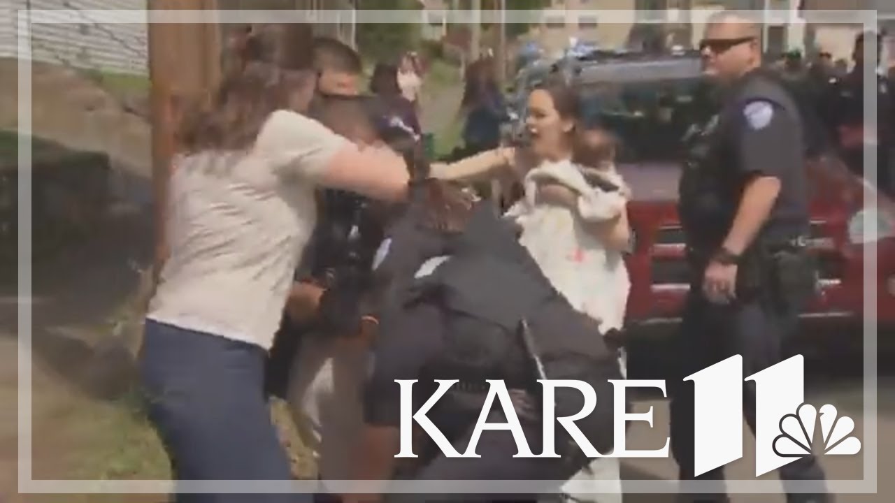 GRAPHIC VIDEO: MA police hold girl's face to the ground as ICE arrests her mother