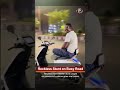 Man Performs Dangerous Bike Stunt on Busy Roa