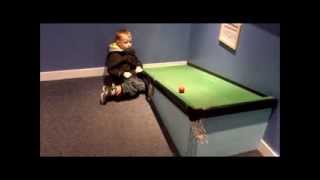 Optical illusion ball rolling uphill against gravity