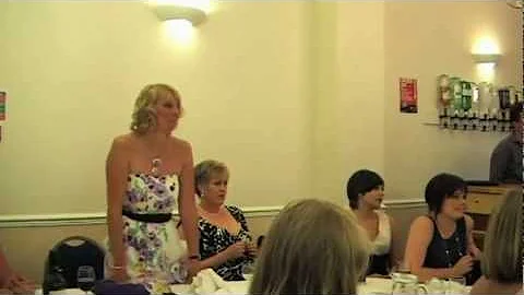 Julie Clifford is presented with her 15 year servi...
