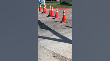 Traffic cones keeping fresh asphalt safe #trafficcone #safety #construction #asphaltpaving