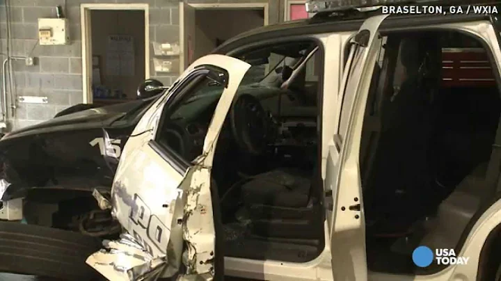 See cop narrowly miss being hit by runaway truck