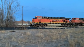 BNSF #6233 leads NB empty coal with Grinstein MAC