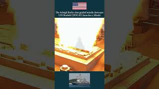 The Arleigh Burke-class guided missile destroyer USS Benfold (DDG 65) launches a Standard Missile