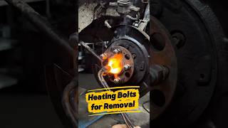 Removing Seized Parts: Applying Heat to Break the Rust.