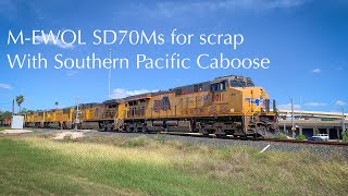 UP AC45CCTE 8011 South leads a M-EWOL into Olmito Tx with SD70Ms for scrap and a SP caboose