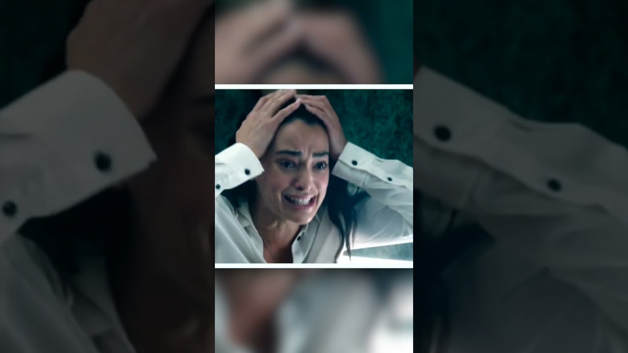 A man and a woman get stuck in an elevator