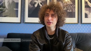 A Cello Playing Robot Performed with a Symphony