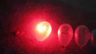 Popping 5 Balloons Instantly With 200Mw Laser