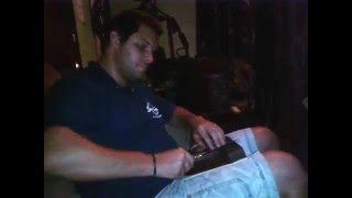 Serial Killer gets a call while sharpening knife