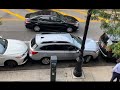 Skilled driver in New York expertly maneuver his car out of a tight parking space
